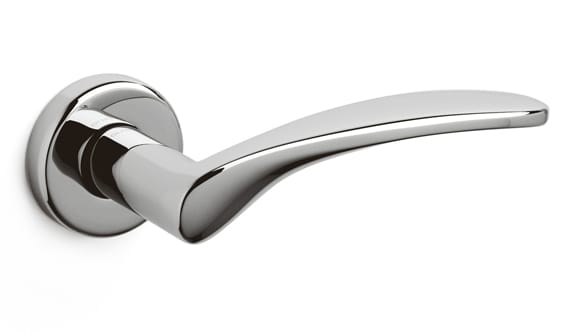 Polished chrome door handle on a white background