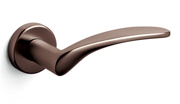 Bronze door handle on a white background