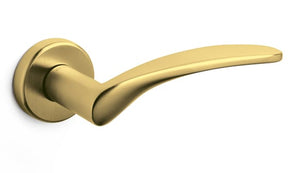 Gold door handle on a white background