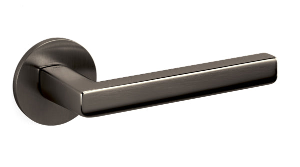 Metal door handle on a white background