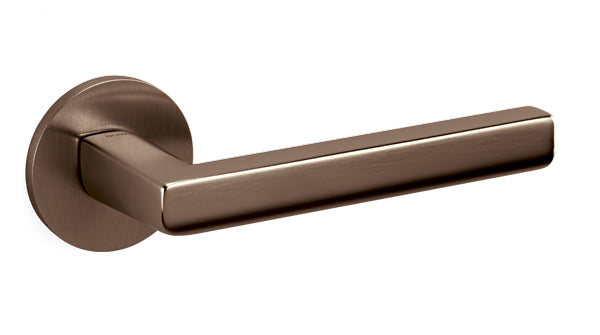 Bronze door handle on a white background