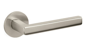 Metallic door handle on a white background