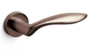 Bronze door handle on a white background