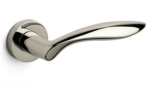 Polished chrome door handle on a white background