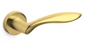 Gold door handle on a white background