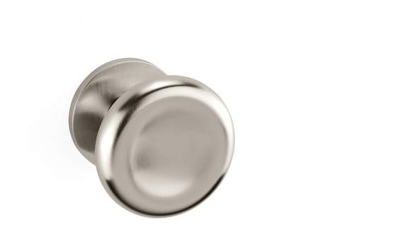 Metallic door knob on a white background