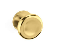 Gold door knob on a white background