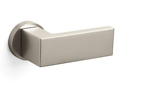 Metallic door handle on a white background