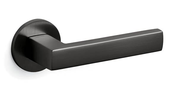 Black door handle on a white background