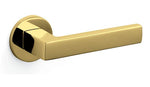 Gold door handle on a white background