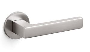Metal door handle on a white background