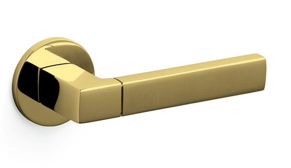 Gold door handle on a white background