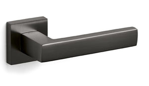 Metallic door handle on a white background