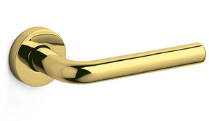 Gold door handle on a white background