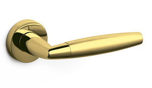 Gold door handle on a white background