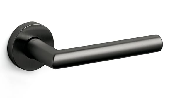 Black and silver door handle on a white background