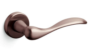 Bronze door handle on a white background