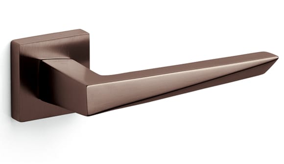 Bronze door handle on a white background