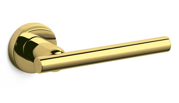 Gold door handle on a white background