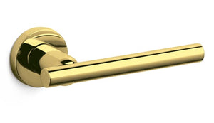 Gold door handle on a white background