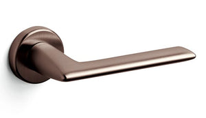 Bronze door handle on a white background