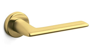 Gold door handle on a white background