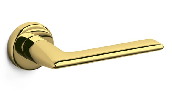Gold door handle on a white background