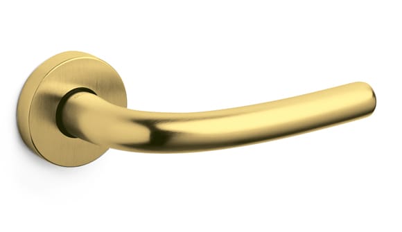Gold door handle on a white background