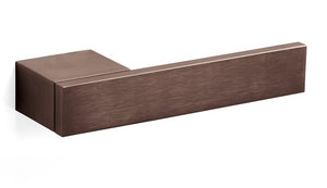 Bronze-colored rectangular object on a white background