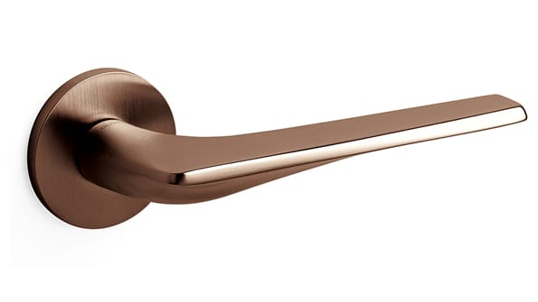 Bronze door handle on a white background