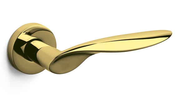 Gold door handle on a white background